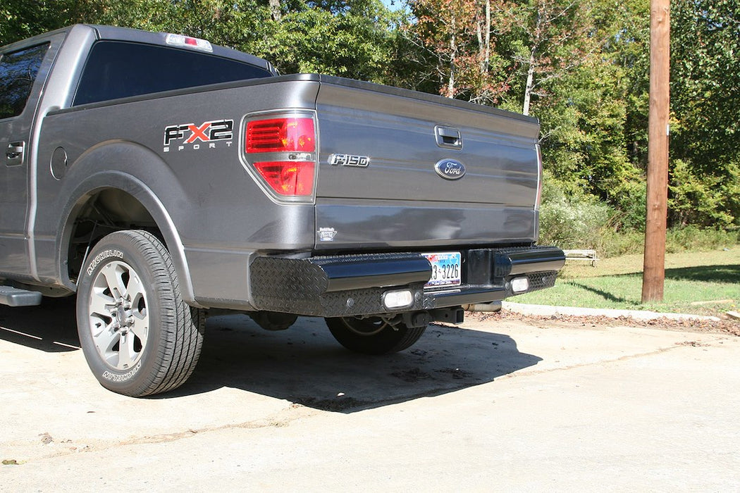 Fab Fours Black Steel Rear Bumpers For 2009-2014 Ford F-150 - FF09-T1750-1