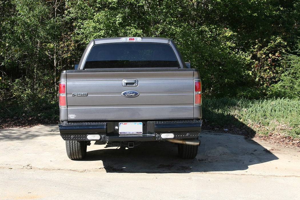 Fab Fours Black Steel Rear Bumpers For 2009-2014 Ford F-150 - FF09-T1750-1