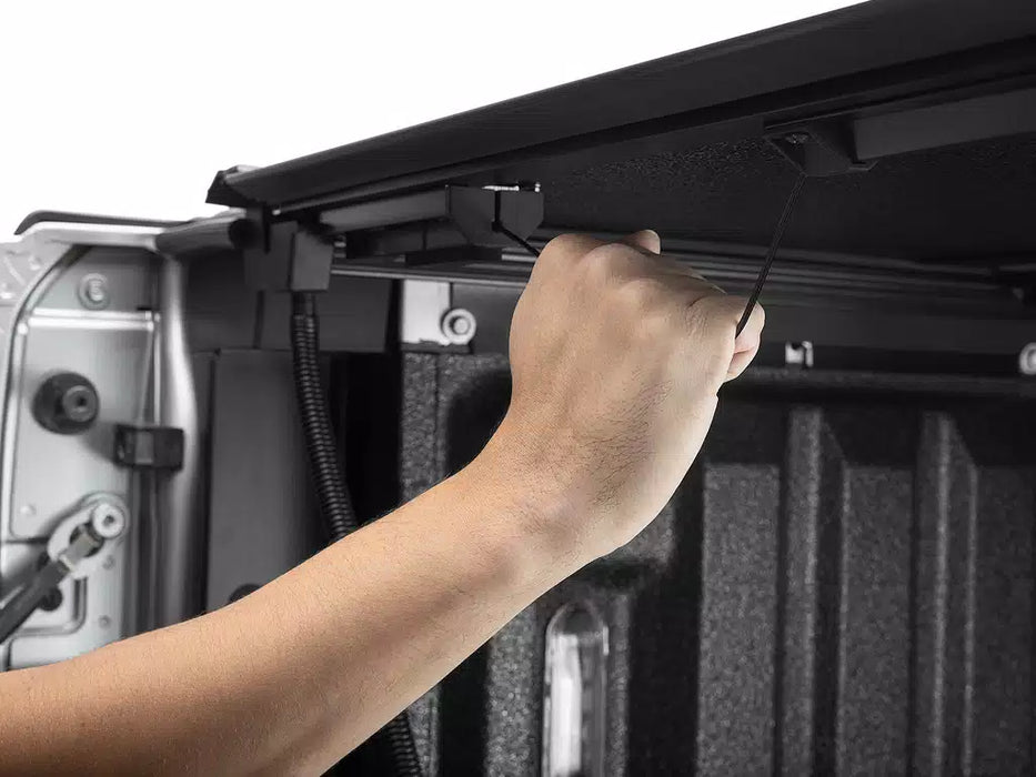 UnderCover Armor Flex Hard Folding Tonneau Cover For 2019-2026 RAM 1500 5'7" Bed