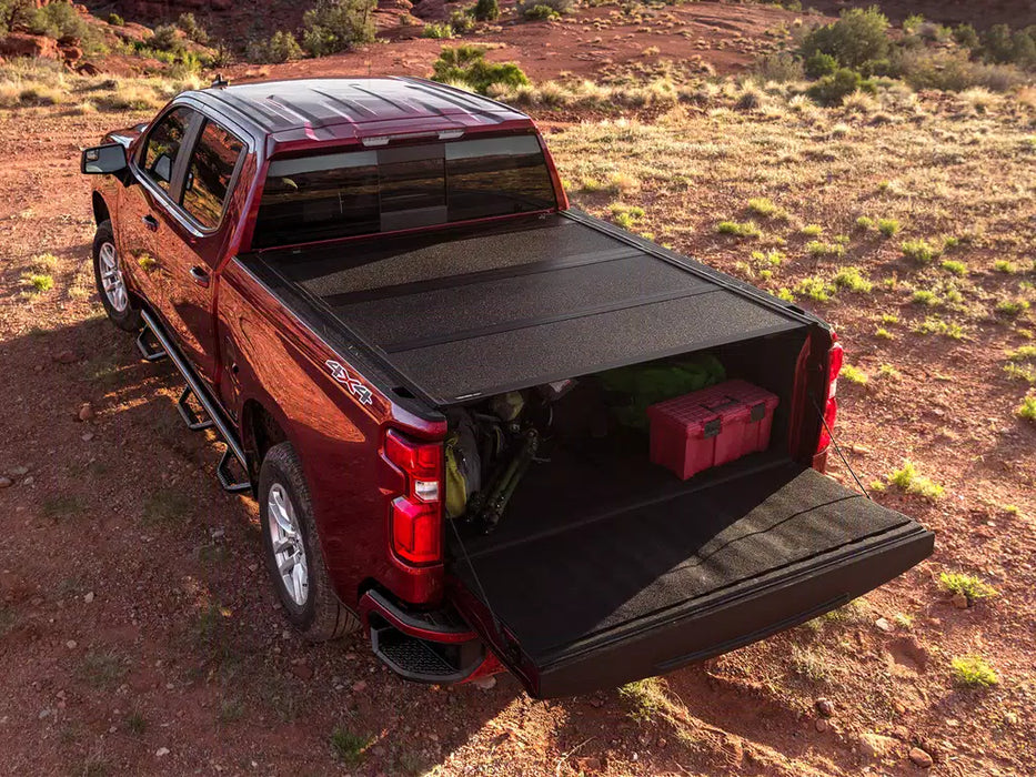 UnderCover Armor Flex Hard Folding Tonneau Cover For 2019-2026 RAM 1500 5'7" Bed