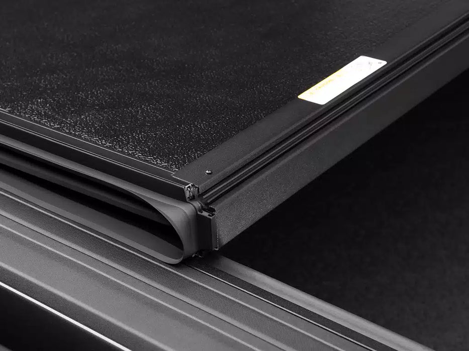 UnderCover Armor Flex Hard Folding Tonneau Cover For 2017-2026 Ford F-250/350 6'9" Bed - AX22021