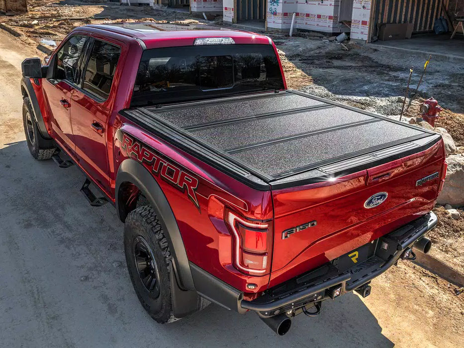 UnderCover Armor Flex Hard Folding Tonneau Cover For 2019-2026 RAM 1500 5'7" Bed