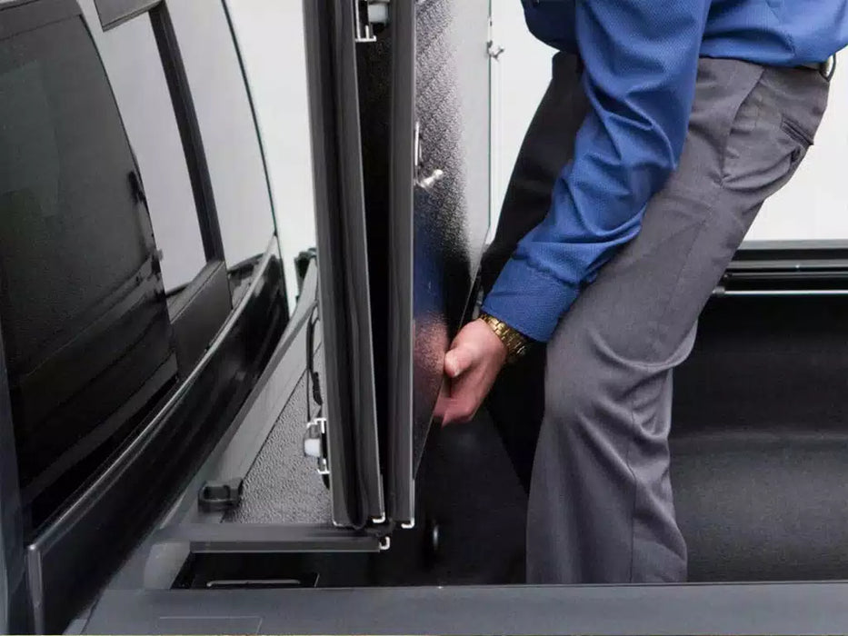 UnderCover Flex Hard Folding Tonneau Cover For 2005-2021 Nissan Frontier 5' Bed