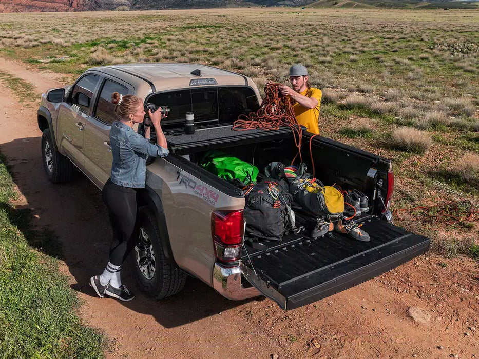 UnderCover Ultra Flex Hard Folding Tonneau Cover For 02-18 RAM 1500 & 19-24 1500 Classic 5'7" Bed - UX32006