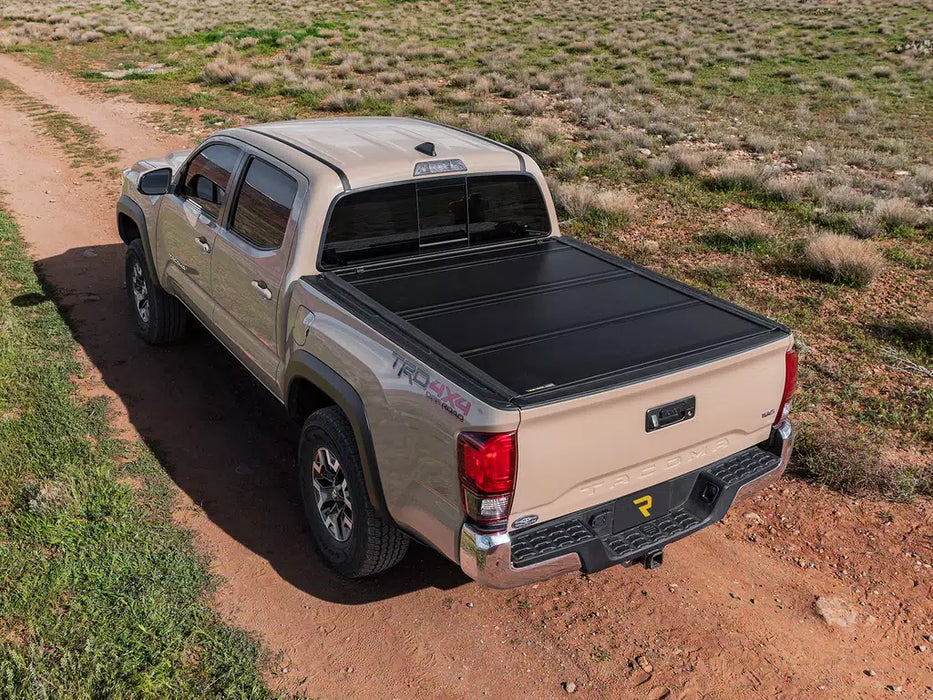 UnderCover Ultra Flex Hard Folding Tonneau Cover For 2016-2023 Toyota Tacoma 6'2" Bed - UX42015