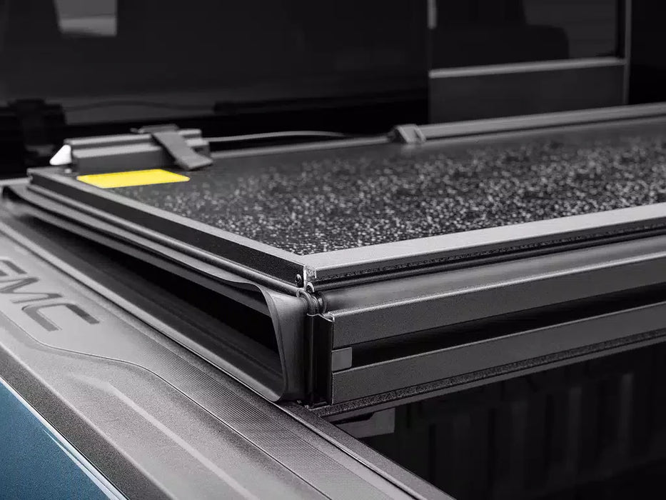 UnderCover Select Hard Folding Tonneau Cover For 02-18 RAM 1500, 19-24 Classic & 03-26 2500/3500 6'4" Bed - SL34004